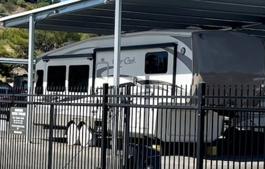 Secure, fenced RV storage with covered parking
